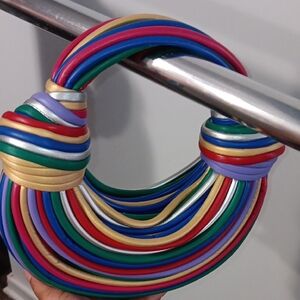 $40 Chic Monochrome Twisted Handle Multicolor Striped Handbag